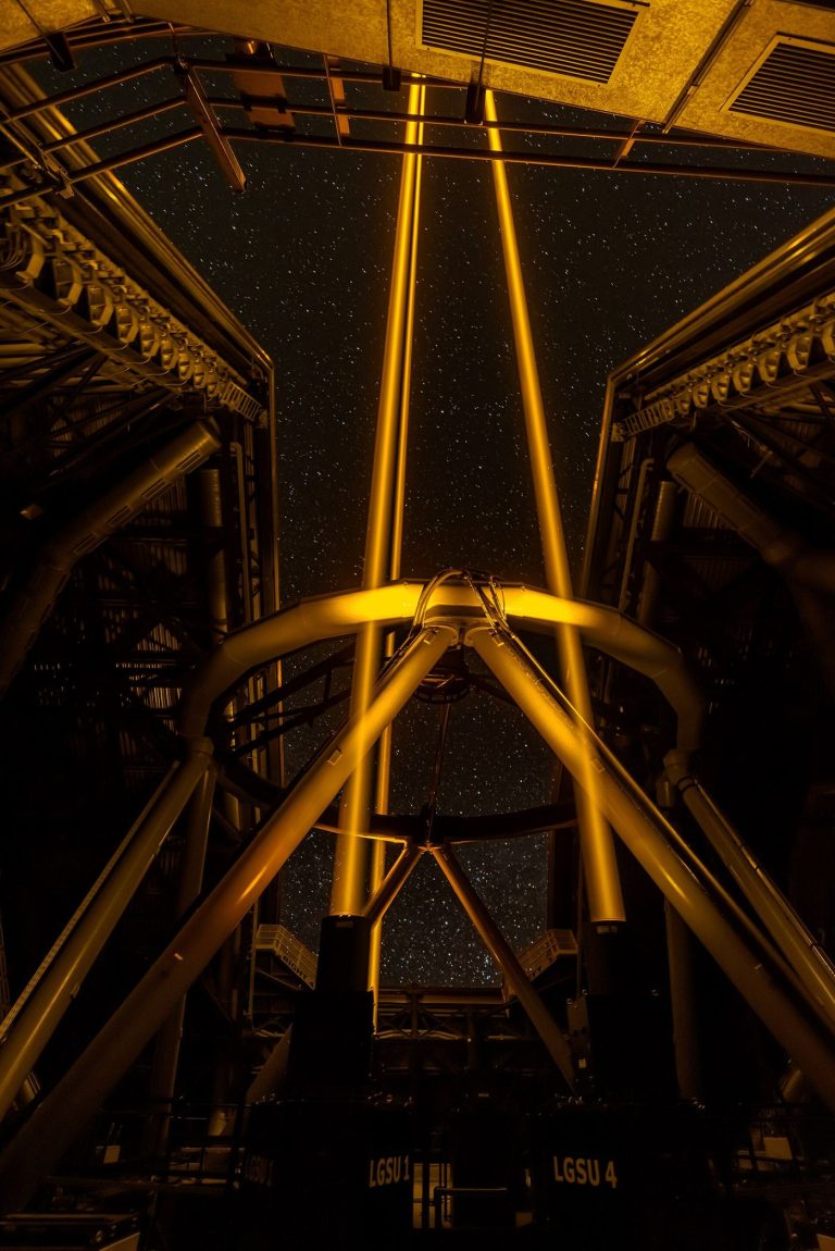 Astronomers Find Water Signs in a Distant Planet’s Sky A telescope silhouetted against a starry night sky