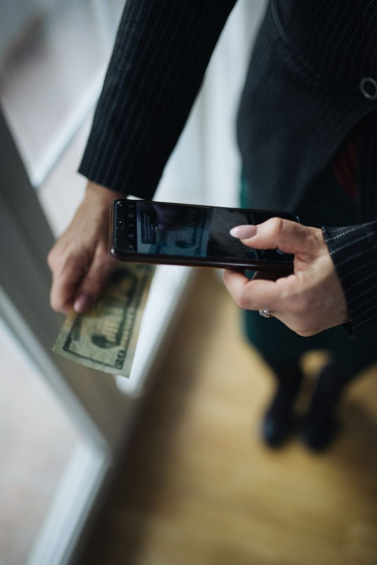 person using a crypto wallet app on a smartphone