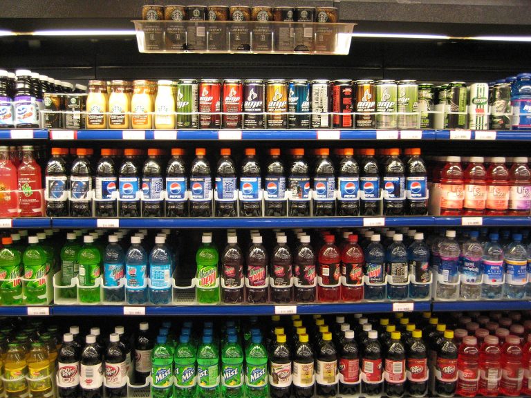 Nine in Ten Anti-Definition Food Papers Had Industry Ties, Researchers Find Assorted groceries and packaged foods on a supermarket shelf